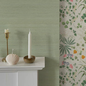 Earth Green grasscloth grasscloth by Deus ex Gardenia in sage green, a woven grasscloth texture above a sideboard
