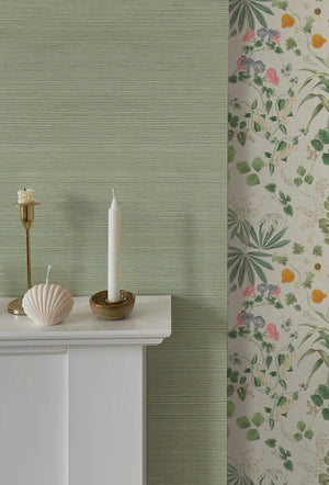 Earth Green grasscloth grasscloth by Deus ex Gardenia in sage green, a woven grasscloth texture above a sideboard