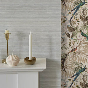 French Grey grasscloth grasscloth by Deus ex Gardenia in grey, a woven grasscloth texture above a sideboard