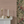 Peach Sand grasscloth grasscloth by Deus ex Gardenia in peach, a woven grasscloth texture above a sideboard