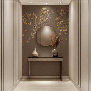 The Ginkgo Tree wallpaper by Dami and Em Design in brown, ginkgo branches behind a console table