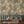 Gentlemen Birds wallpaper by Brand McKenzie in olive, birds hidden among leaves in a dining room