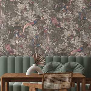 Gentlemen Birds wallpaper by Brand McKenzie in dusky pink, birds hidden among leaves in a dining room