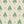 Agra velvet by Annika Reed in green, flat sample of block-print flowers in a trellis
