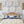 Hamble Yachts wallpaper by XV Interiors in blue, sketched yachts in a bedroom