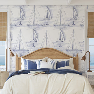 Hamble Yachts wallpaper by XV Interiors in blue, sketched yachts in a bedroom