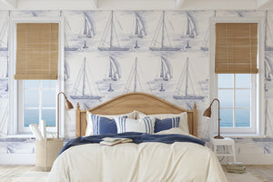 Hamble Yachts wallpaper by XV Interiors in blue, sketched yachts in a bedroom