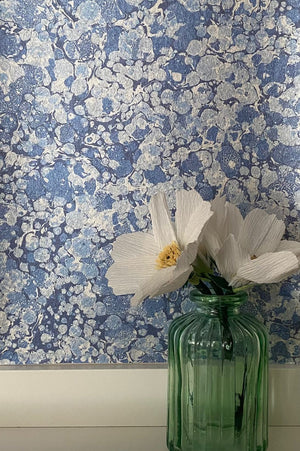 Ditzy wallpaper by House of Amitié in blue, flat sample of fine hand-marbled pattern