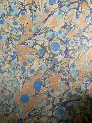 Juniper Neptune wallpaper by House of Amitié in blue and gold, full repeat of hand-marbled pattern