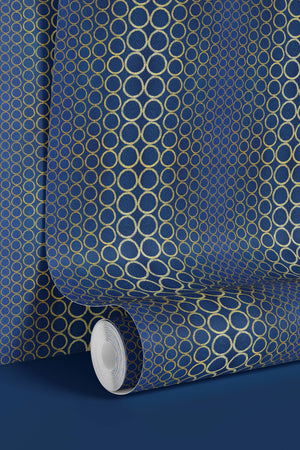 Halo Boulevard wallpaper by Liberty James Studio in navy, roll showing a geometric halo pattern