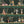 Happy Hour wallpaper by Brand McKenzie in green, close-up of animals at a cocktail bar