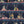 Happy Hour wallpaper by Brand McKenzie in navy and pink, close view of animals at a cocktail bar