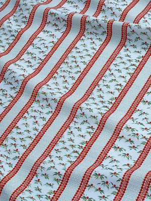 Hélène Red wallpaper by Claire de Quénetain in blue and red, draped, showing striped bands
