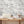 Hidden Clouds wallpaper by Brand McKenzie in grey, clouds with hidden animals in a hallway