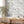 Hidden Clouds wallpaper by Brand McKenzie in grey, clouds with hidden animals in an entryway