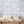 Hidden Clouds wallpaper by Brand McKenzie in pale blue, close view of clouds with hidden animals