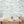 Hidden Clouds wallpaper by Brand McKenzie in pale green, clouds with hidden animals in a hallway