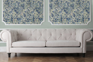 Juniper Blue Anise wallpaper by House of Amitié in blue and cream, hand-marbled pattern in a living room