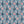 Honiton Lace wallpaper by Annika Reed in blue and pink, pattern sample of lace-style flowers