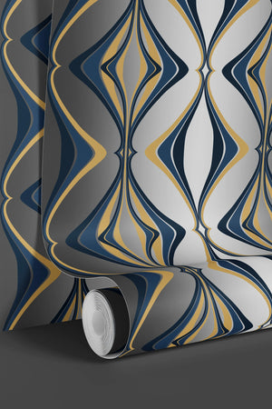 Hourglass wallpaper by Liberty James Studio in teal and silver, partly unrolled roll showing a retro hourglass wave