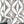 Hourglass wallpaper by Liberty James Studio in grey, partly unrolled roll showing a retro hourglass wave