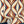 Hourglass wallpaper by Liberty James Studio in red and navy, a retro hourglass wave on a bedroom wall