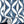 Hourglass wallpaper by Liberty James Studio in blue, a retro hourglass wave in a bedroom