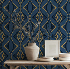 Hourglass wallpaper by Liberty James Studio in navy and gold, partly unrolled roll showing a retro hourglass wave