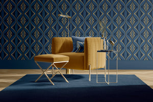 Hourglass wallpaper by Liberty James Studio in navy and gold, a retro hourglass wave above a cabinet