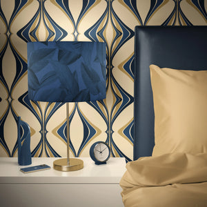Hourglass wallpaper by Liberty James Studio in navy and gold, a retro hourglass wave behind a bed