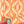 Hourglass wallpaper by Liberty James Studio in orange and pink, sample roll showing a retro hourglass wave