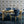 Hourglass wallpaper by Liberty James Studio in teal and gold, a retro hourglass wave in a dining area