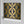 Hourglass wallpaper by Liberty James Studio in teal and silver, sample roll showing a retro hourglass wave