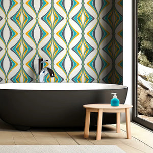 Hourglass wallpaper by Liberty James Studio in turquoise and yellow, sample roll showing a retro hourglass wave