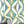 Hourglass wallpaper by Liberty James Studio in turquoise and yellow, a retro hourglass wave in a bathroom setting