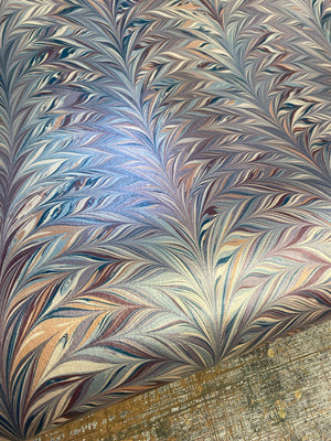 Foxtail Woodstock wallpaper by House of Amitié in blue and gold, roll showing combed marbling (alternate view)