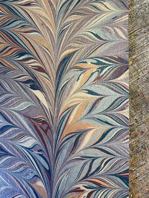 Foxtail Woodstock wallpaper by House of Amitié in blue and gold, sample roll showing combed marbling