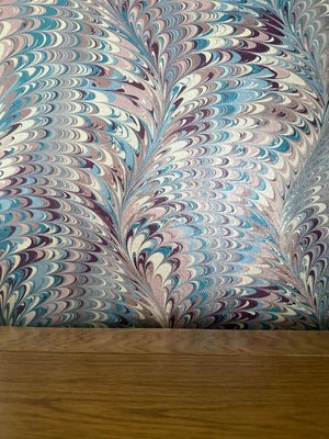 Pirouette in Berry Imperial wallpaper by House of Amitié in pink and blue, full repeat of combed marbling