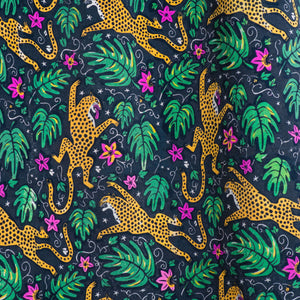 How the Leopard Got His Spots velvet by The Monkey Puzzle Tree in green and orange, flat sample