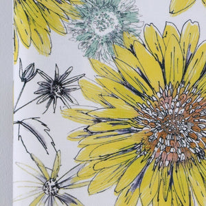 Organic Sunflower and Flora fabric by Seed Home Designs in yellow and white, full repeat of large sunflowers