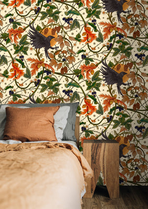 Raven wallpaper by Tamlyn in ivory, ravens among autumn leaves behind a bed