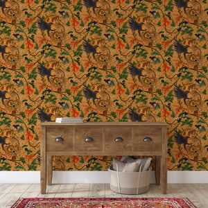 Raven wallpaper by Tamlyn in orange, ravens among autumn leaves above a sideboard