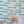 Swimming Sardines fabric by Seed Home Designs in blue and white, swimming sardines in a styled room setting