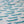 Swimming Sardines fabric by Seed Home Designs in blue and white, in soft folds showing swimming sardines