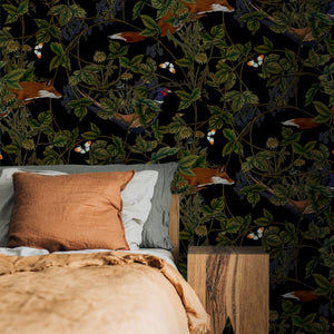 Fox Midnight wallpaper by Tamlyn in black and green, foxes among foliage in a bedroom