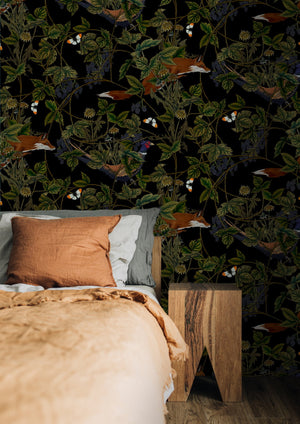 Fox Midnight wallpaper by Tamlyn in black and green, foxes among foliage in a bedroom