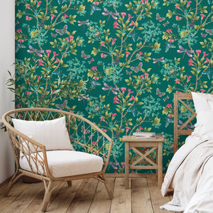 Jewel a Flutter wallpaper by Brand McKenzie in teal and pink, birds and blossoms on a living room wall
