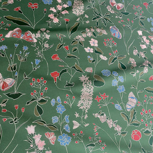 Josepha linen by Claire de Quénetain in green, full repeat of scattered flowers and birds