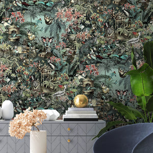 Jungle Life wallpaper by Brand McKenzie in aqua and coral, close-up of jungle animals in dense foliage