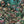 Jungle Life wallpaper by Brand McKenzie in dark green and pink, close-up of jungle animals in dense foliage